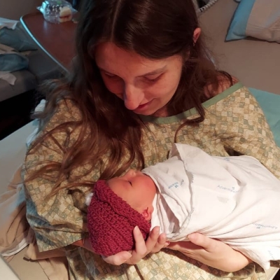 Kathryn holding her baby girl